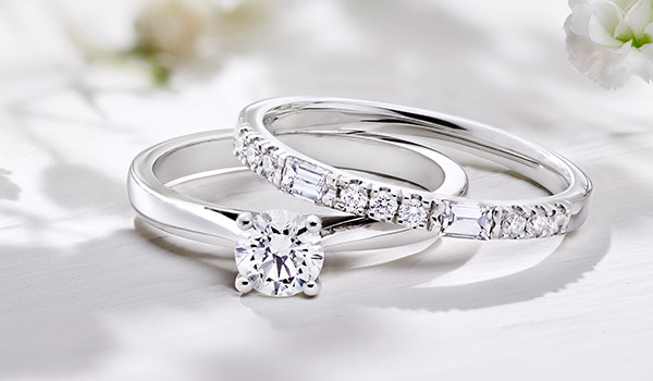 Custom Hand Design Engagement and Wedding Rings